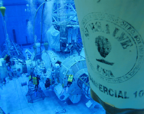 Divers performing undersea tasks using a variety of Subsalve products.