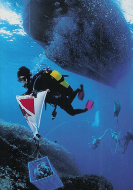 Diver in the process of deploying a safety quad bag