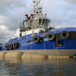 Ocean Tundra rig surrounded by large salvage pontoons